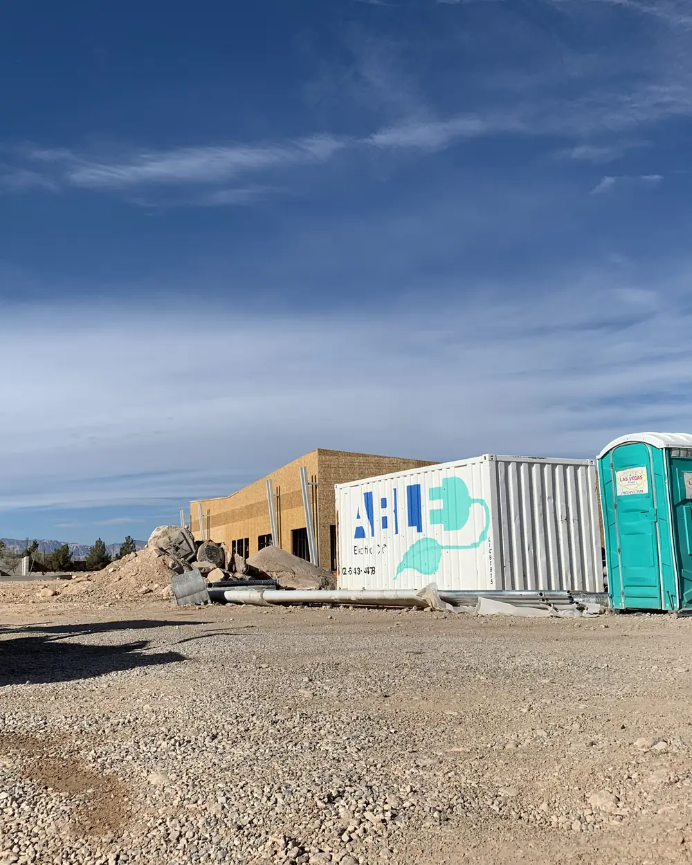 Able Electric job-site container on a ground-up commercial project